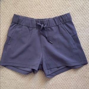 Lululemon purple on the fly shorts, sz 4
